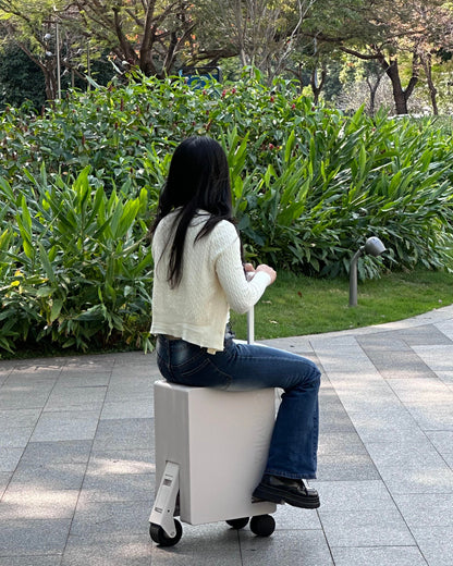 Travilo Electric Rideable Suitcase Smart Travel Luggage Easy Airport Mobility
