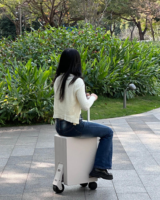 Travilo Electric Rideable Suitcase Smart Travel Luggage Easy Airport Mobility